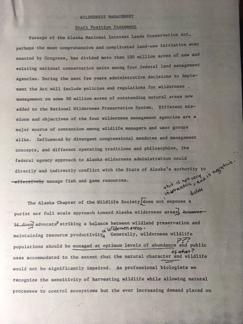 scanned draft position statement with handwritten edits